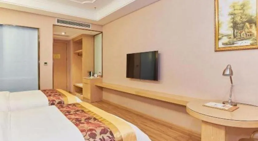 Bed in Vienna Hotel Fuzhou University Town Boshihou