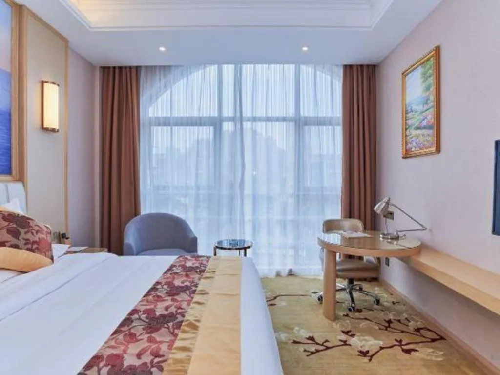 Bed in Vienna Hotel Fuzhou University Town Boshihou