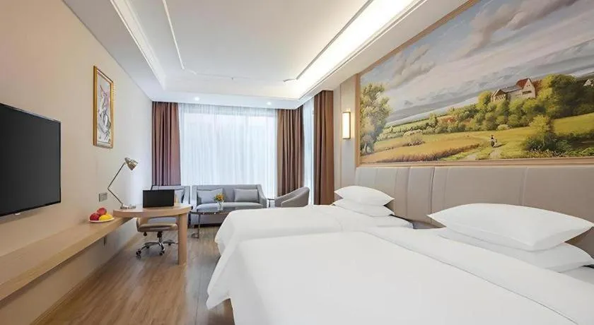 Bed in Vienna Hotel Fuzhou University Town Boshihou