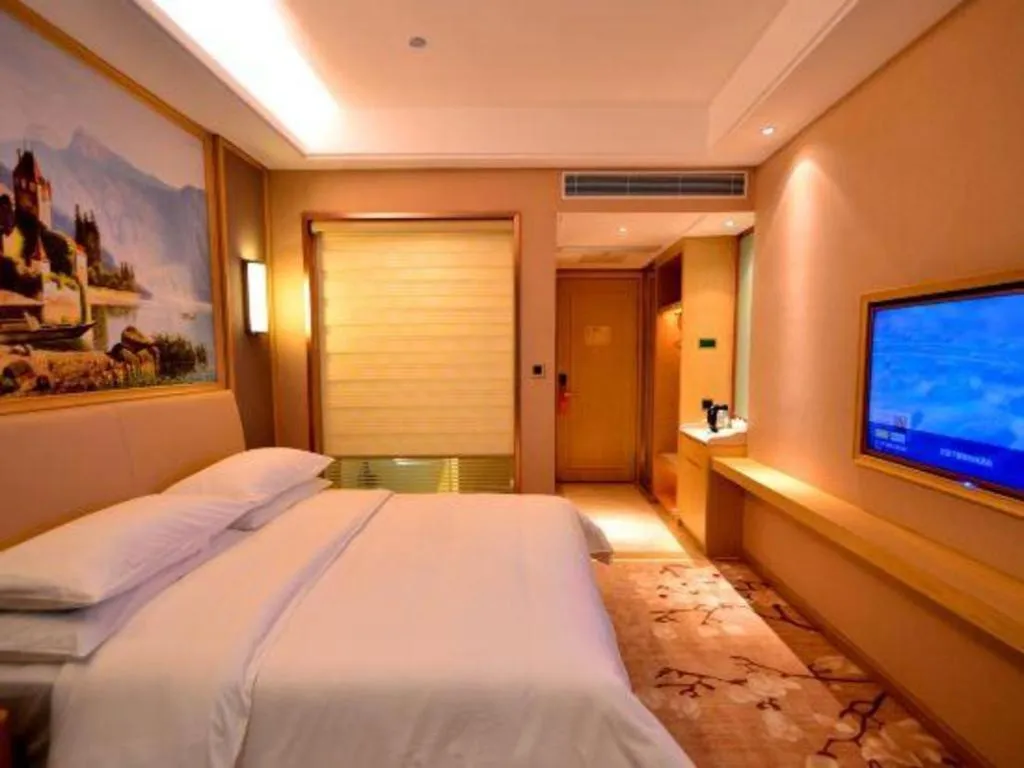 Bed in Vienna Hotel Guangdong Zhaoqing East Station Dinghu Mountain Scenic Area