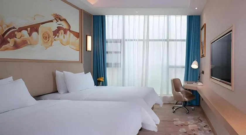 Bed in Vienna Hotel Guangdong Zhaoqing East Station Dinghu Mountain Scenic Area