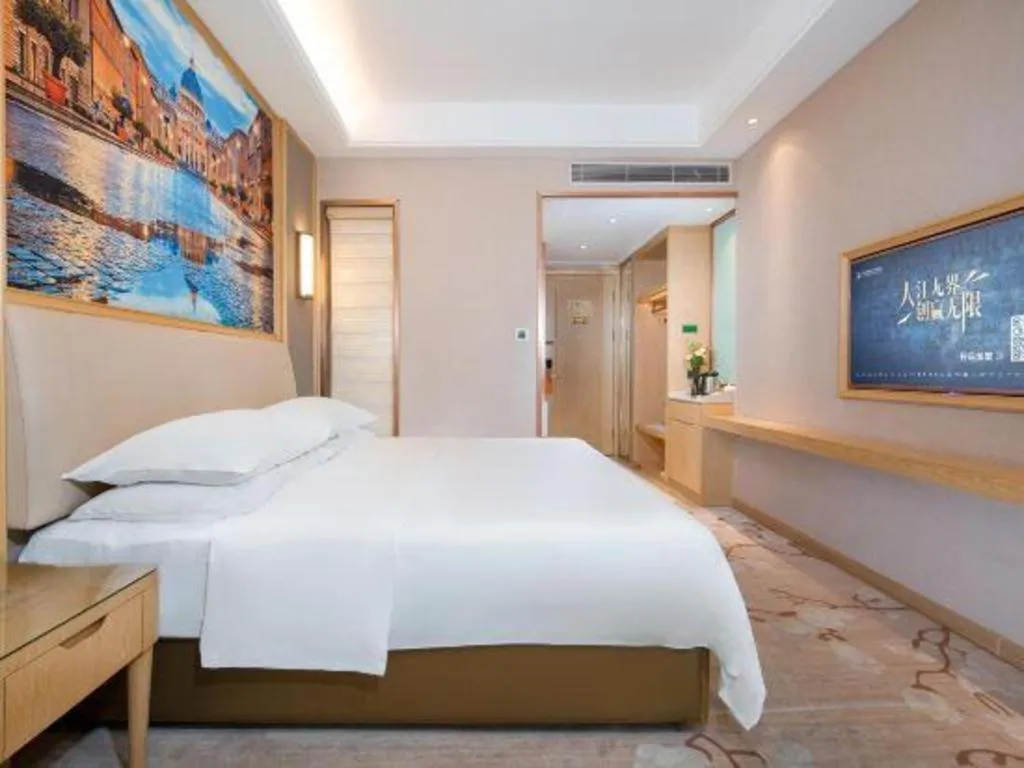 Bed in Vienna Hotel Guangdong Zhaoqing East Station Dinghu Mountain Scenic Area