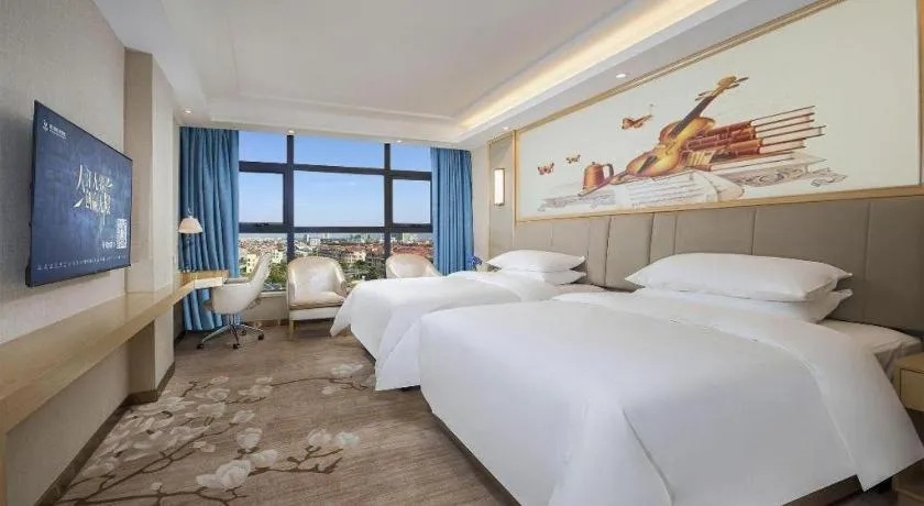 Bed in Vienna Hotel Guangdong Zhaoqing East Station Dinghu Mountain Scenic Area