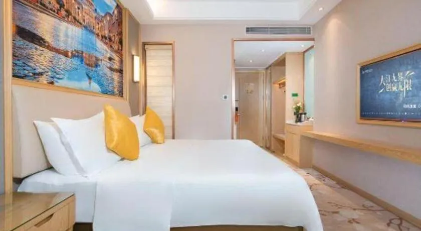 Bed in Vienna Hotel Guangdong Zhaoqing East Station Dinghu Mountain Scenic Area
