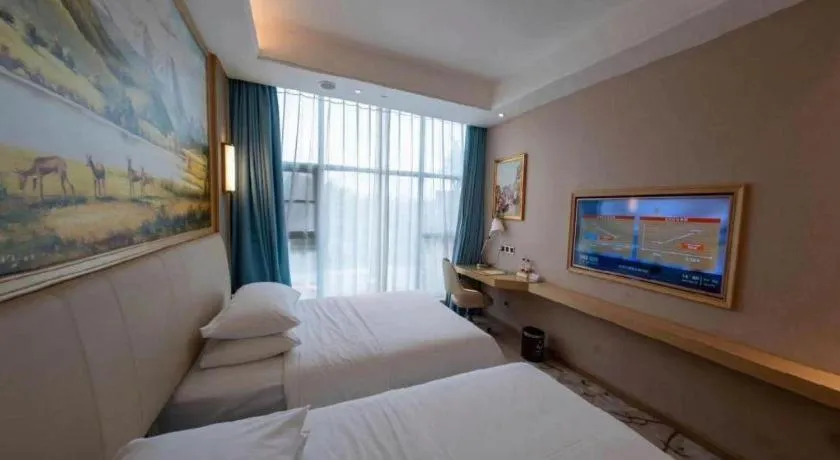 Bed in Vienna Hotel Guangdong Zhaoqing East Station Dinghu Mountain Scenic Area