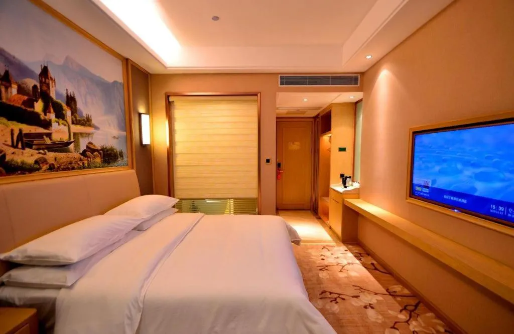 Bed in Vienna Hotel Guangdong Zhaoqing East Station Dinghu Mountain Scenic Area