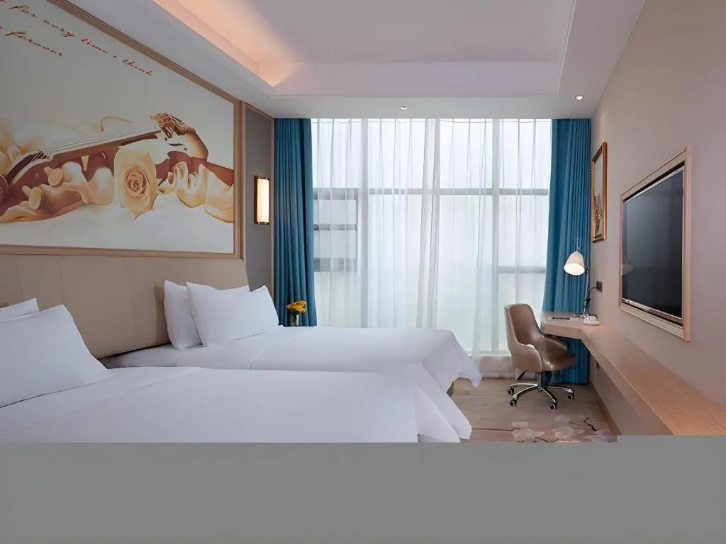 Bed in Vienna Hotel Guangdong Zhaoqing East Station Dinghu Mountain Scenic Area