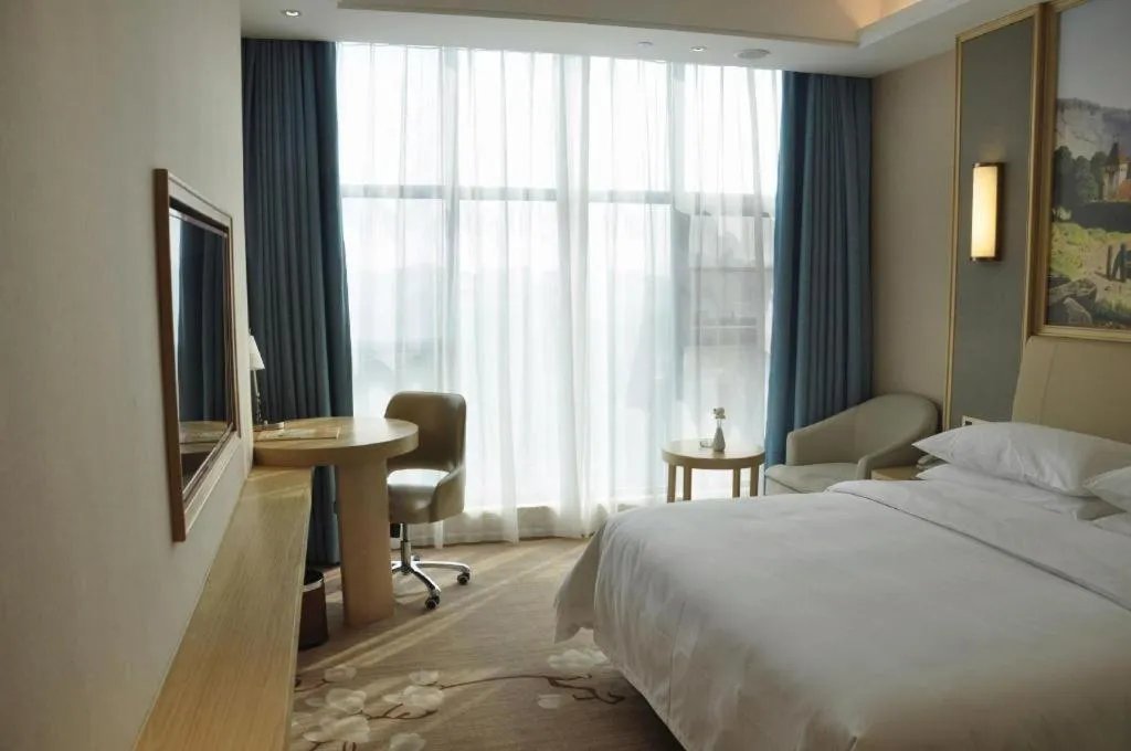 Bed in Vienna Hotel Guangdong Zhaoqing East Station Dinghu Mountain Scenic Area
