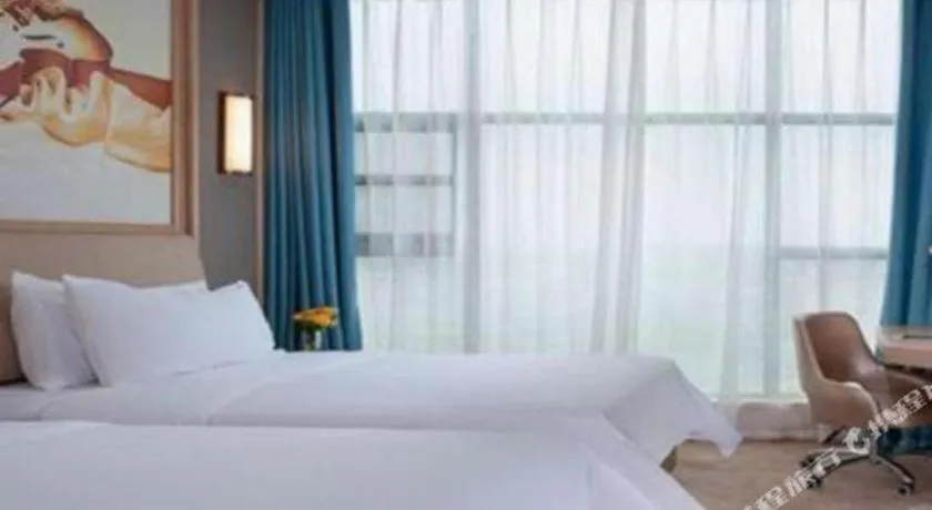 Bed in Vienna Hotel Guangdong Zhaoqing East Station Dinghu Mountain Scenic Area