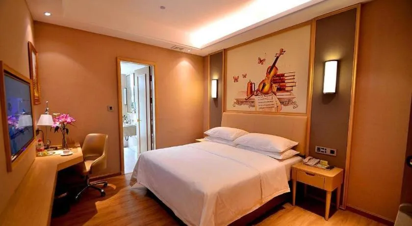 Bed in Vienna Hotel Guangdong Zhaoqing East Station Dinghu Mountain Scenic Area