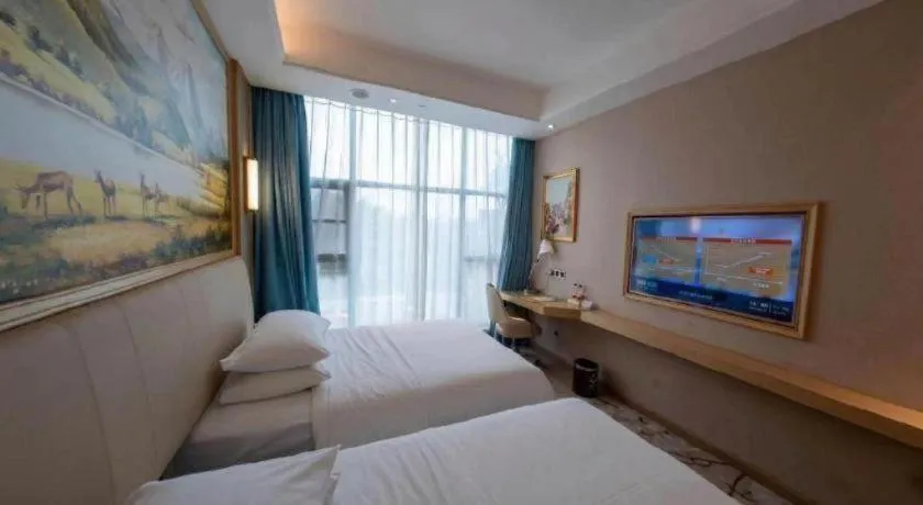 Bed in Vienna Hotel Guangdong Zhaoqing East Station Dinghu Mountain Scenic Area