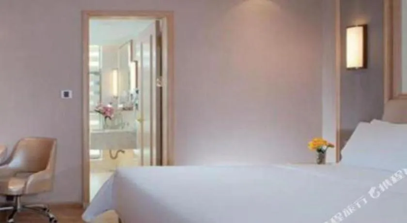 Bed in Vienna Hotel Guangdong Zhaoqing East Station Dinghu Mountain Scenic Area