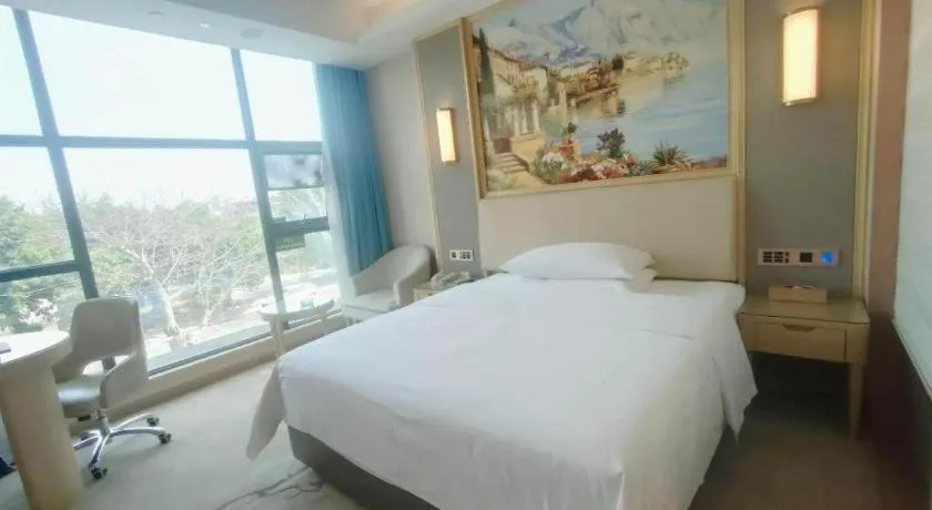 Bed in Vienna Hotel Guangdong Zhaoqing East Station Dinghu Mountain Scenic Area