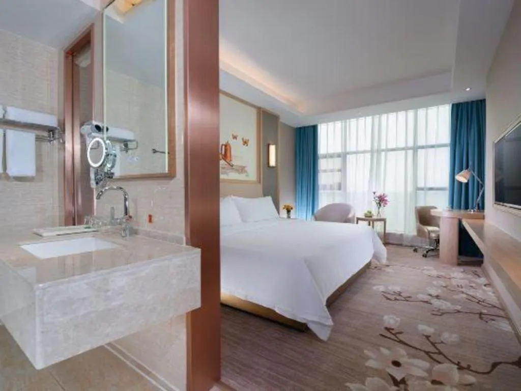 Bed in Vienna Hotel Guangdong Zhaoqing East Station Dinghu Mountain Scenic Area