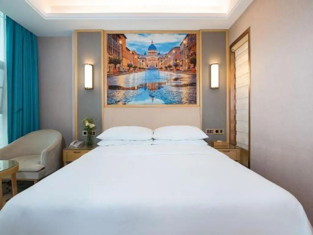 Bed in Vienna Hotel Guangdong Zhaoqing East Station Dinghu Mountain Scenic Area