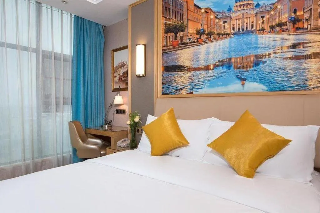 Bed in Vienna Hotel Guangdong Zhaoqing East Station Dinghu Mountain Scenic Area