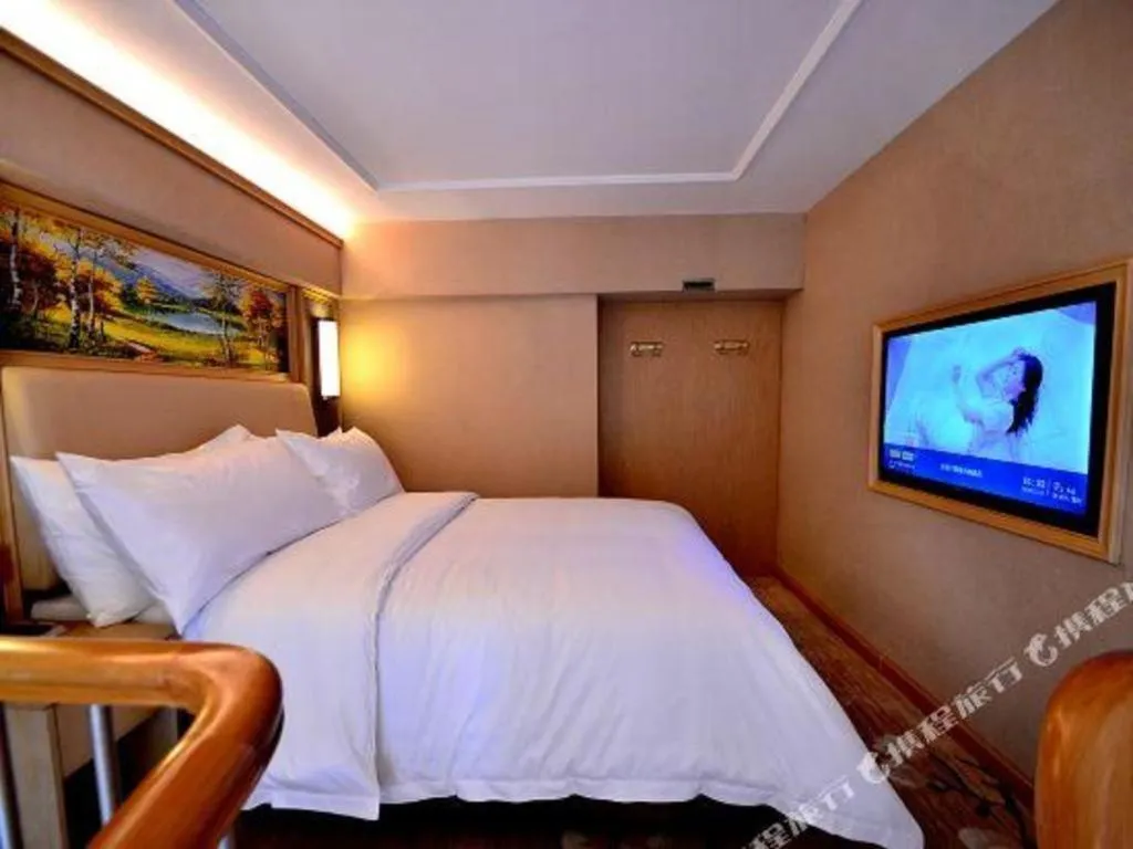 Bed in Vienna Hotel Guangdong Zhaoqing East Station Dinghu Mountain Scenic Area