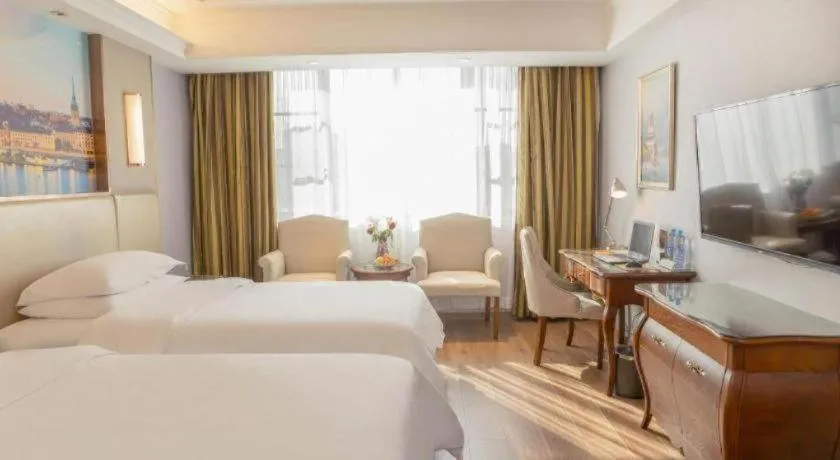 Bed in Vienna Hotel Jiangxi Fuzhou Lichuan Kangshu