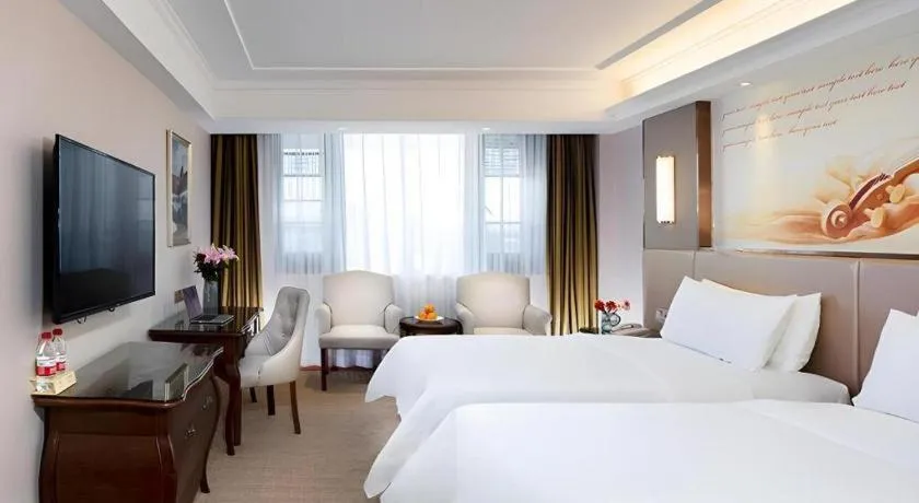 Bed in Vienna Hotel Jiangxi Fuzhou Lichuan Kangshu