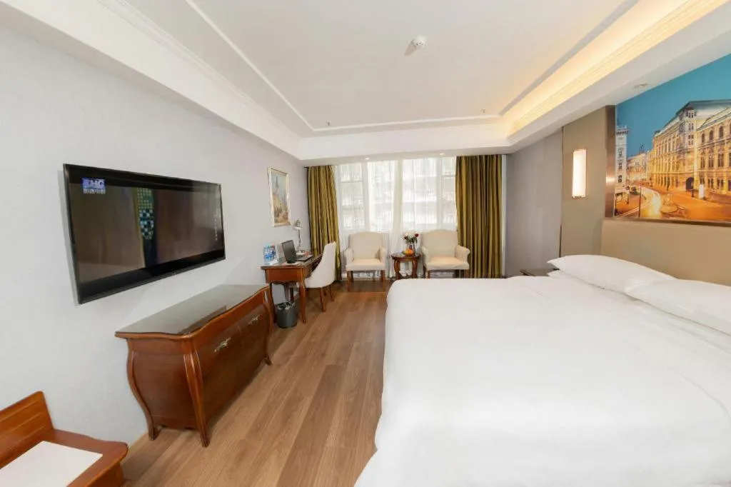 Bed in Vienna Hotel Jiangxi Fuzhou Lichuan Kangshu