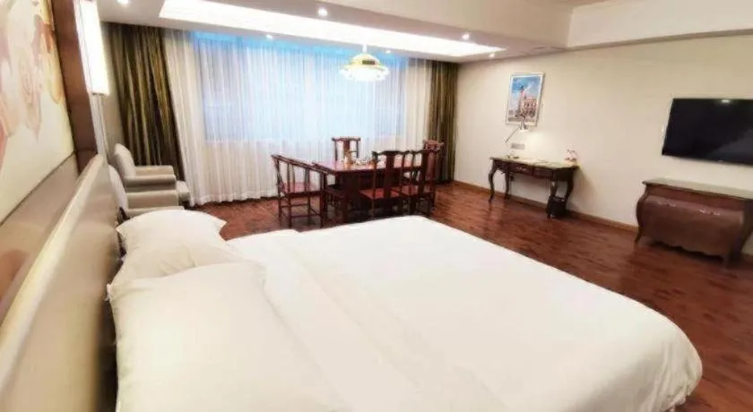 Bed in Vienna Hotel Jiangxi Fuzhou Lichuan Kangshu