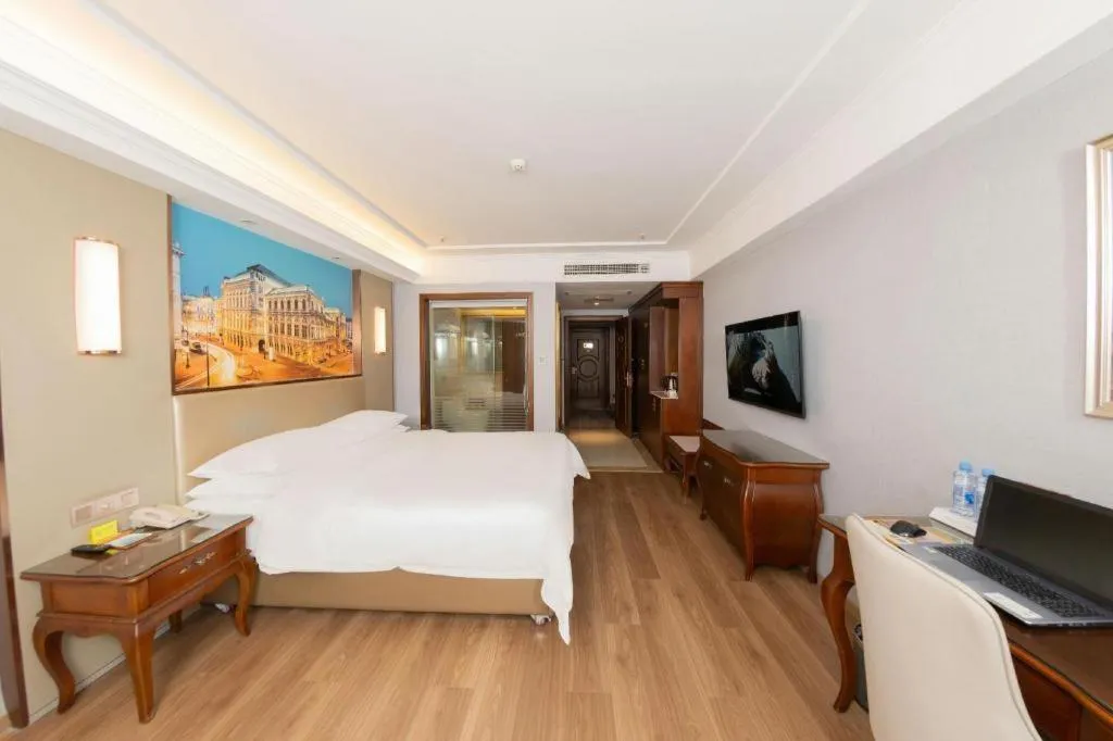 Bed in Vienna Hotel Jiangxi Fuzhou Lichuan Kangshu