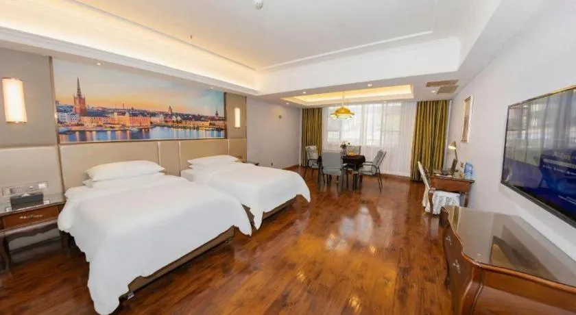 Bed in Vienna Hotel Jiangxi Fuzhou Lichuan Kangshu