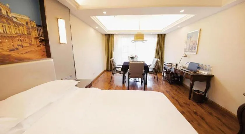 Bed in Vienna Hotel Jiangxi Fuzhou Lichuan Kangshu