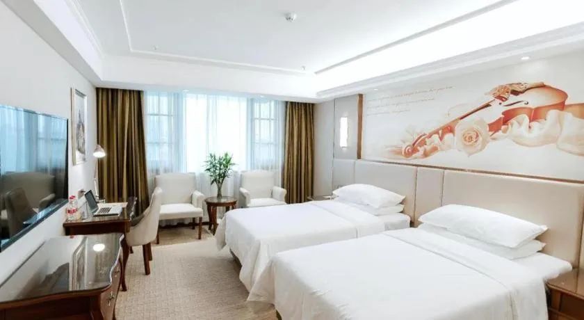 Bed in Vienna Hotel Jiangxi Fuzhou Lichuan Kangshu