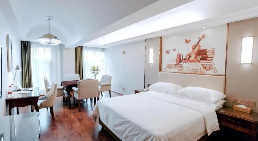 Bed in Vienna Hotel Jiangxi Fuzhou Lichuan Kangshu