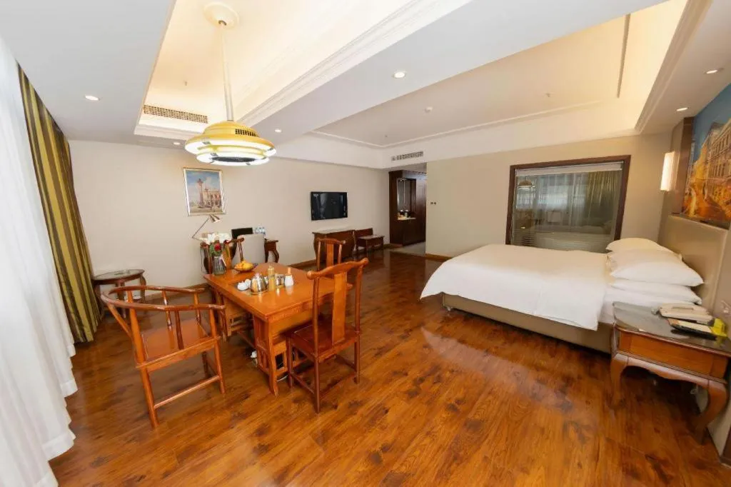 Bed in Vienna Hotel Jiangxi Fuzhou Lichuan Kangshu