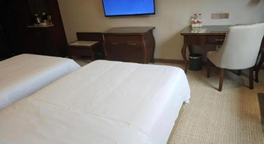 Bed in Vienna Hotel Jiangxi Fuzhou Lichuan Kangshu