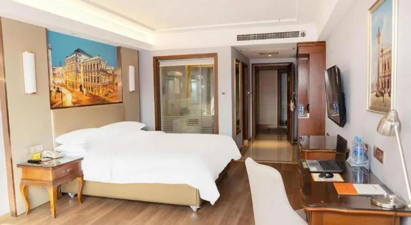 Bed in Vienna Hotel Jiangxi Fuzhou Lichuan Kangshu