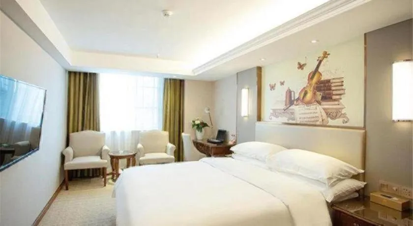 Bed in Vienna Hotel Jiangxi Fuzhou Lichuan Kangshu