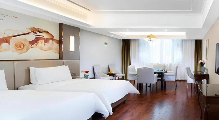 Bed in Vienna Hotel Jiangxi Fuzhou Lichuan Kangshu