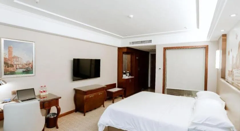 Bed in Vienna Hotel Jiangxi Fuzhou Lichuan Kangshu