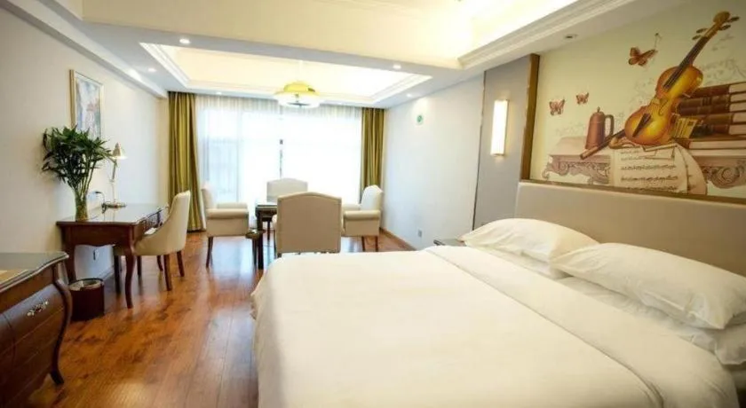 Bed in Vienna Hotel Jiangxi Fuzhou Lichuan Kangshu