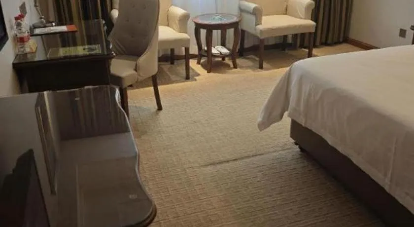 Bed in Vienna Hotel Jiangxi Fuzhou Lichuan Kangshu