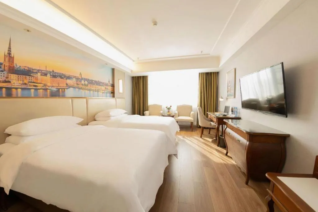 Bed in Vienna Hotel Jiangxi Fuzhou Lichuan Kangshu