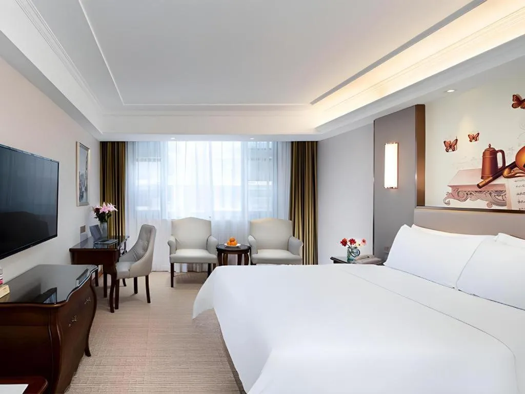 Bed in Vienna Hotel Jiangxi Fuzhou Lichuan Kangshu