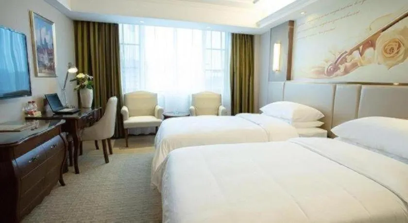 Bed in Vienna Hotel Jiangxi Fuzhou Lichuan Kangshu