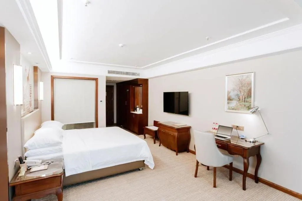 Bed in Vienna Hotel Jiangxi Fuzhou Lichuan Kangshu