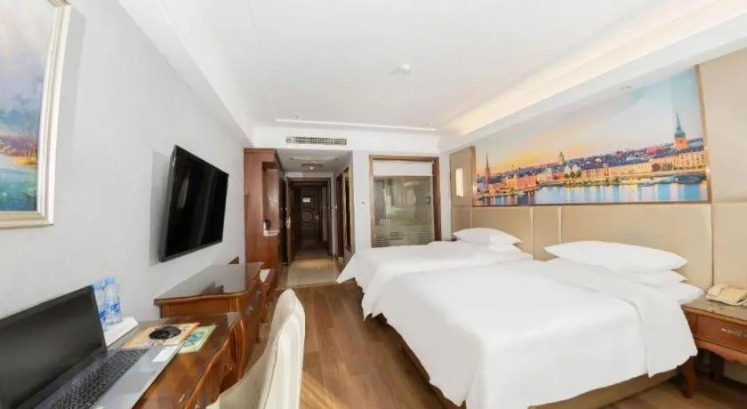 Bed in Vienna Hotel Jiangxi Fuzhou Lichuan Kangshu