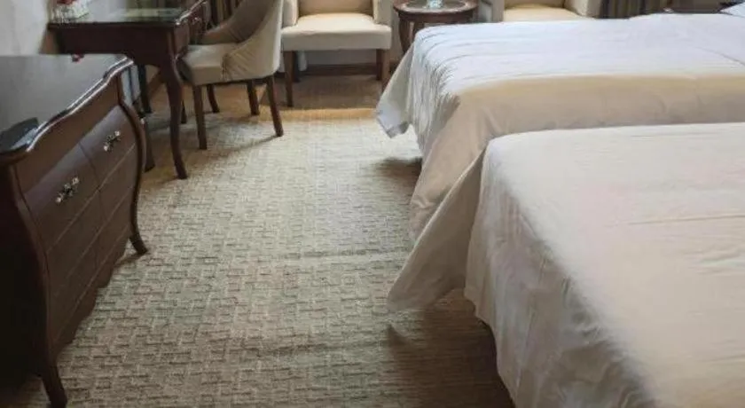 Bed in Vienna Hotel Jiangxi Fuzhou Lichuan Kangshu