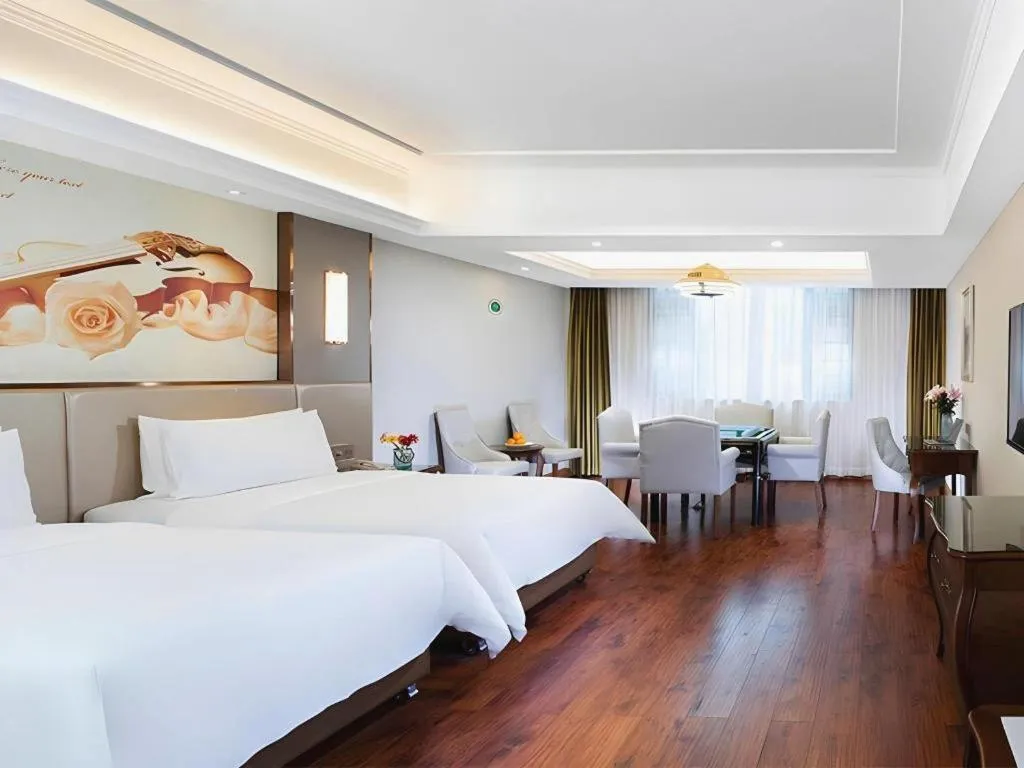 Bed in Vienna Hotel Jiangxi Fuzhou Lichuan Kangshu