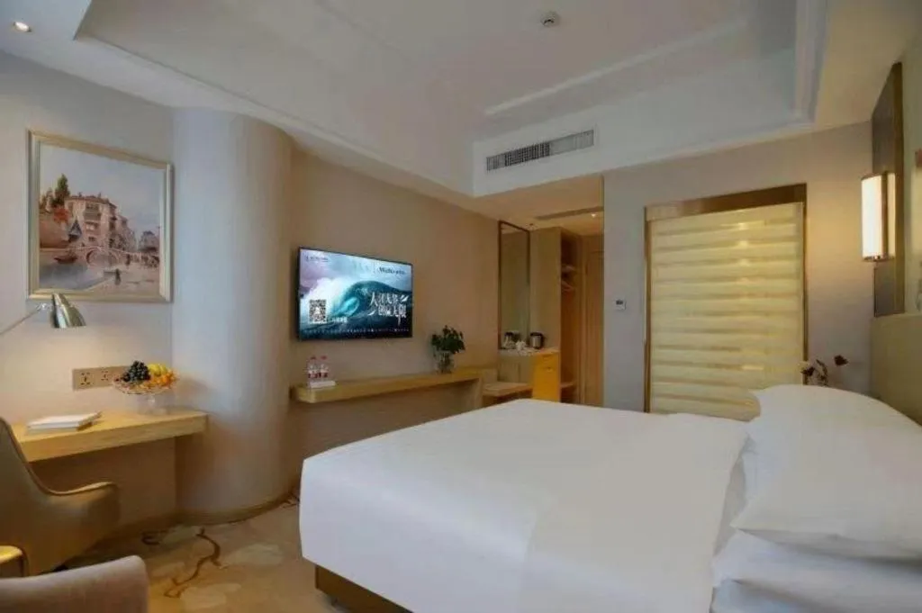 Bed in Vienna Hotel Yunnan Lijiang Ancient City