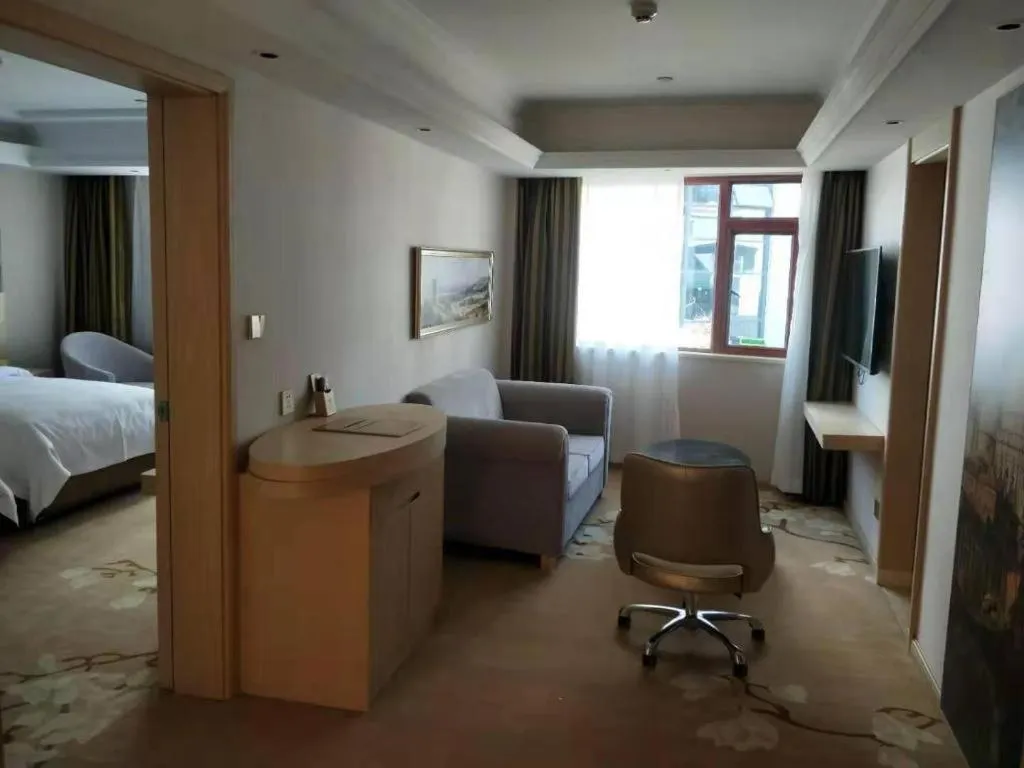 Bed in Vienna Hotel Yunnan Lijiang Ancient City