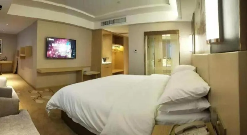 Bed in Vienna Hotel Yunnan Lijiang Ancient City