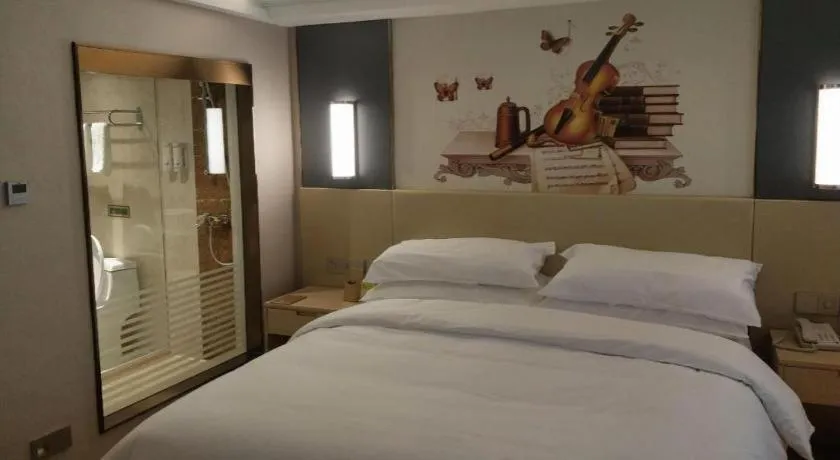 Bed in Vienna Hotel Yunnan Lijiang Ancient City