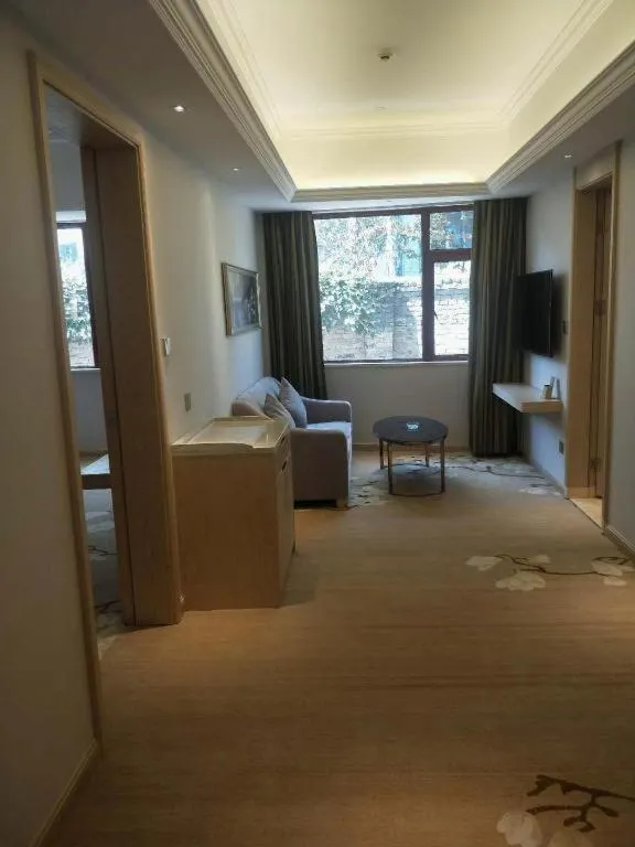 Bed in Vienna Hotel Yunnan Lijiang Ancient City